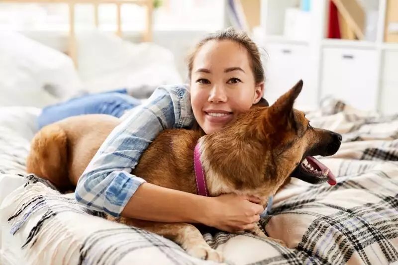 woman spending time with her dog