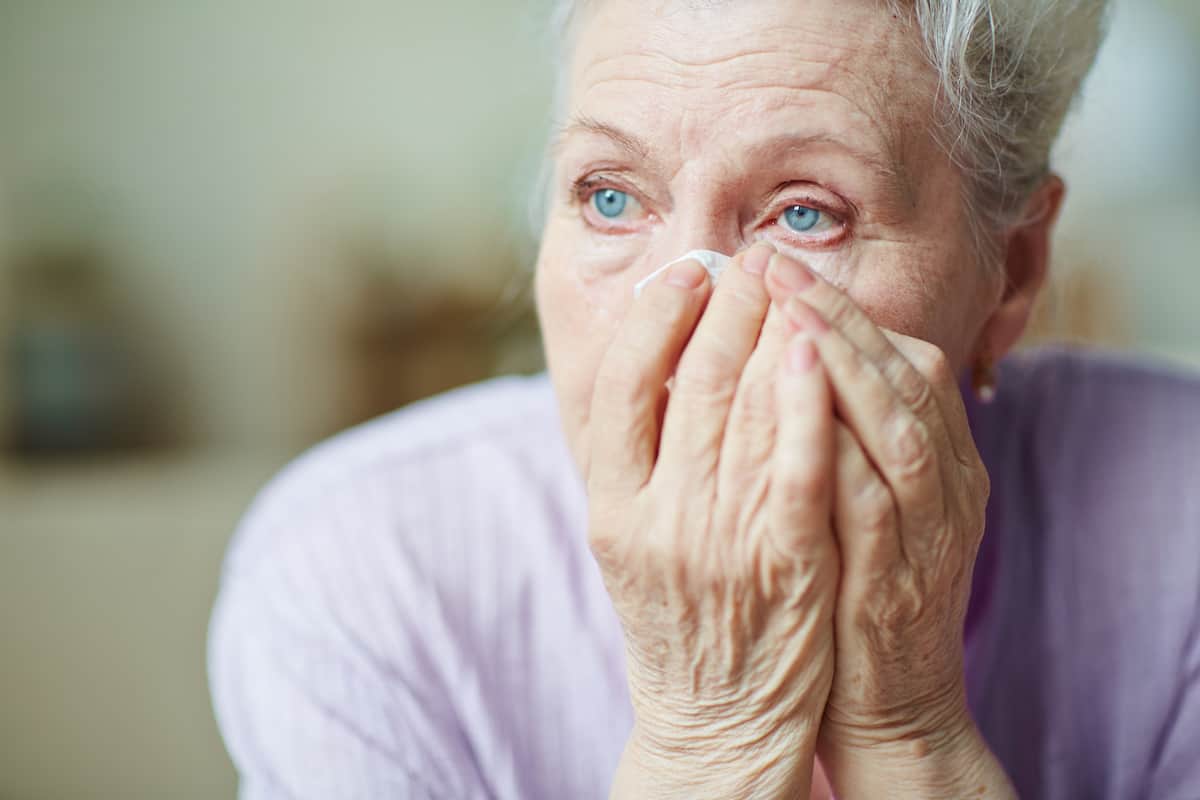 Crying old woman